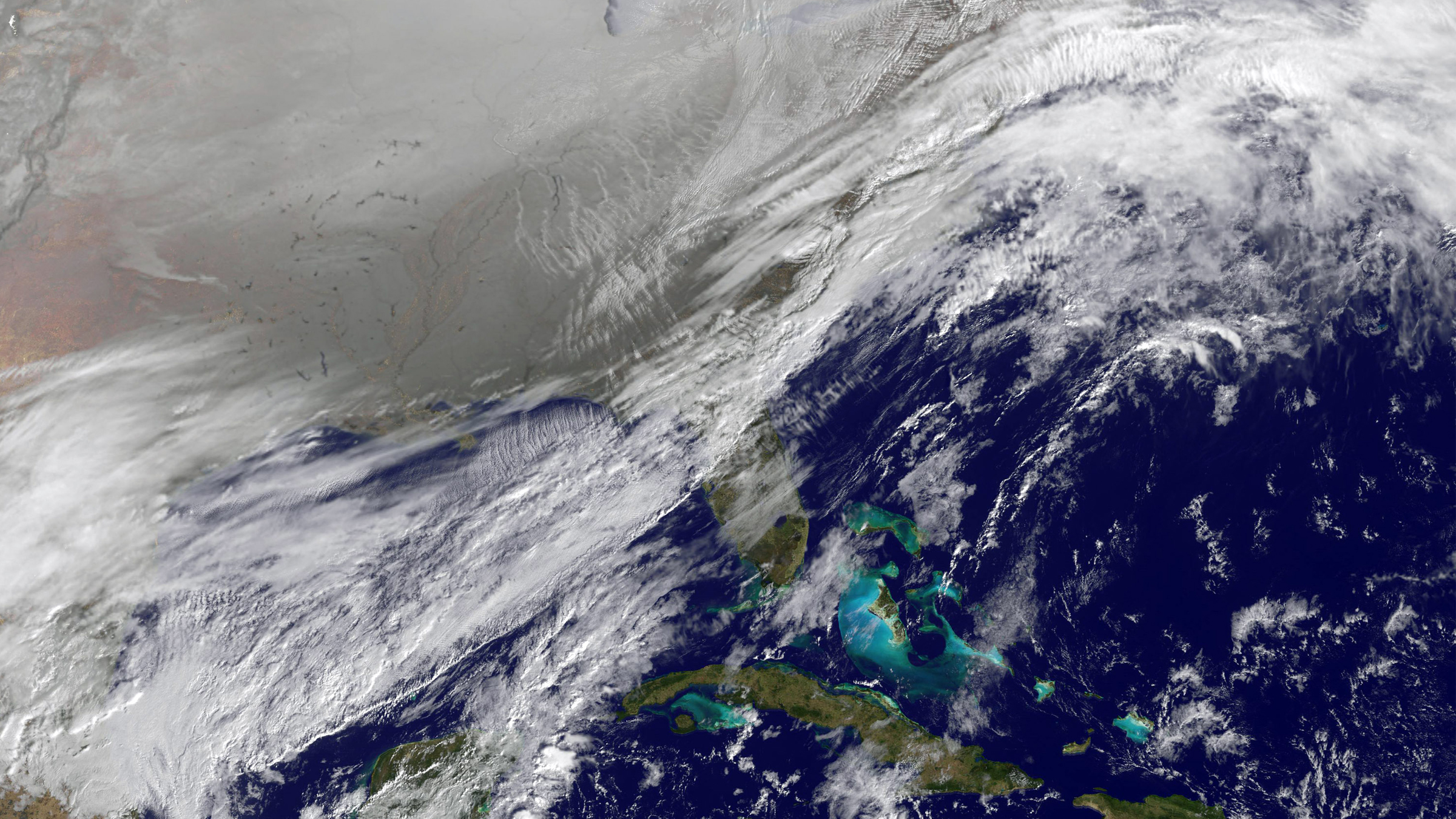 Satellite image of southeastern US with snow clouds of it. 