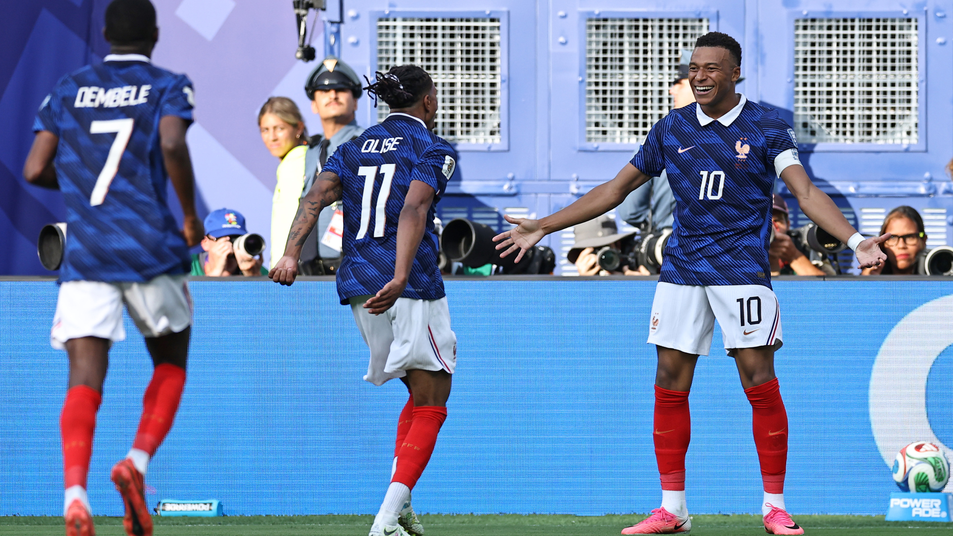 Kylian Mbappe #10 of France celebrates with teammate Michael Olise #11 after scoring his team's third goal during the FIFA World Cup 2026 Round Of 32 match between France and Sweden