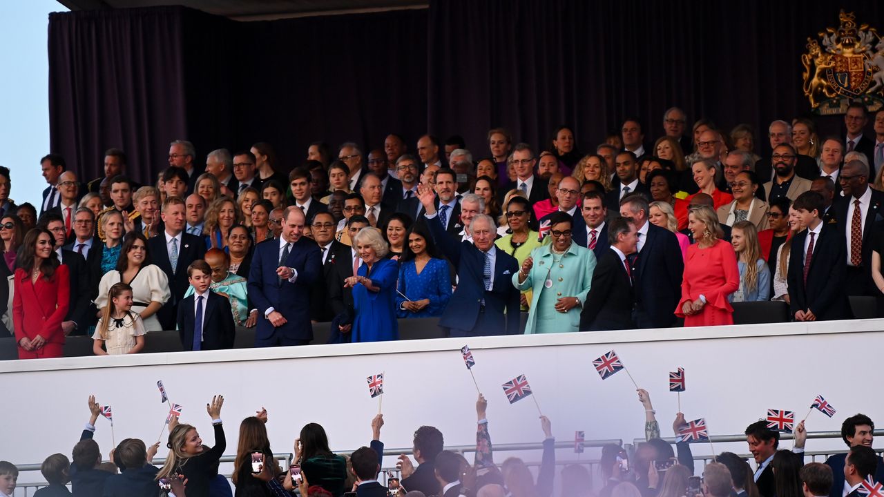 Royals copied Queen Elizabeth&#039;s signature style. Seen here people cheer as King Charles III and Camilla, the Queen Consort acknowledge the crowd at the The Coronation Concert 