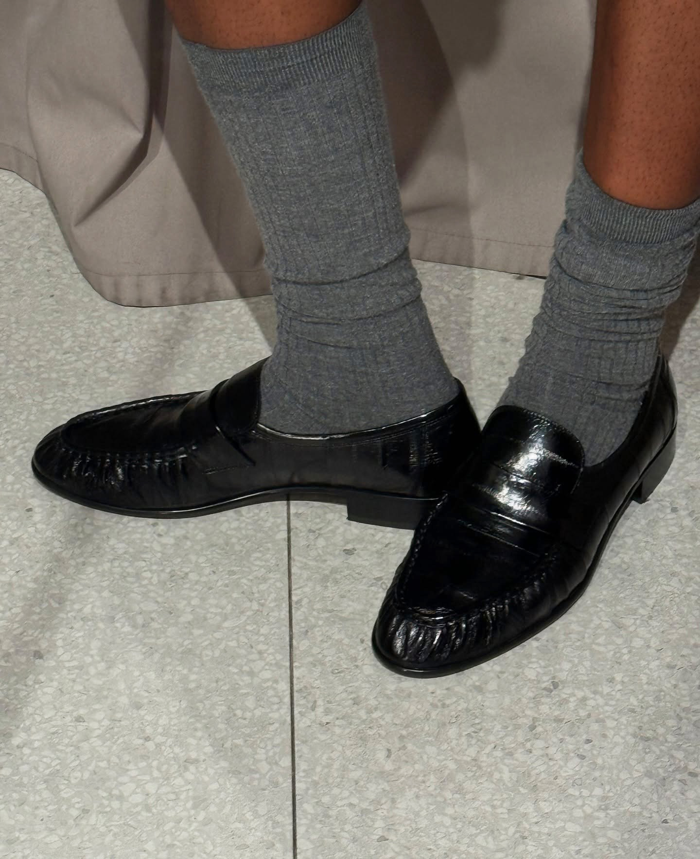 Influencer wearing the gray sock trend