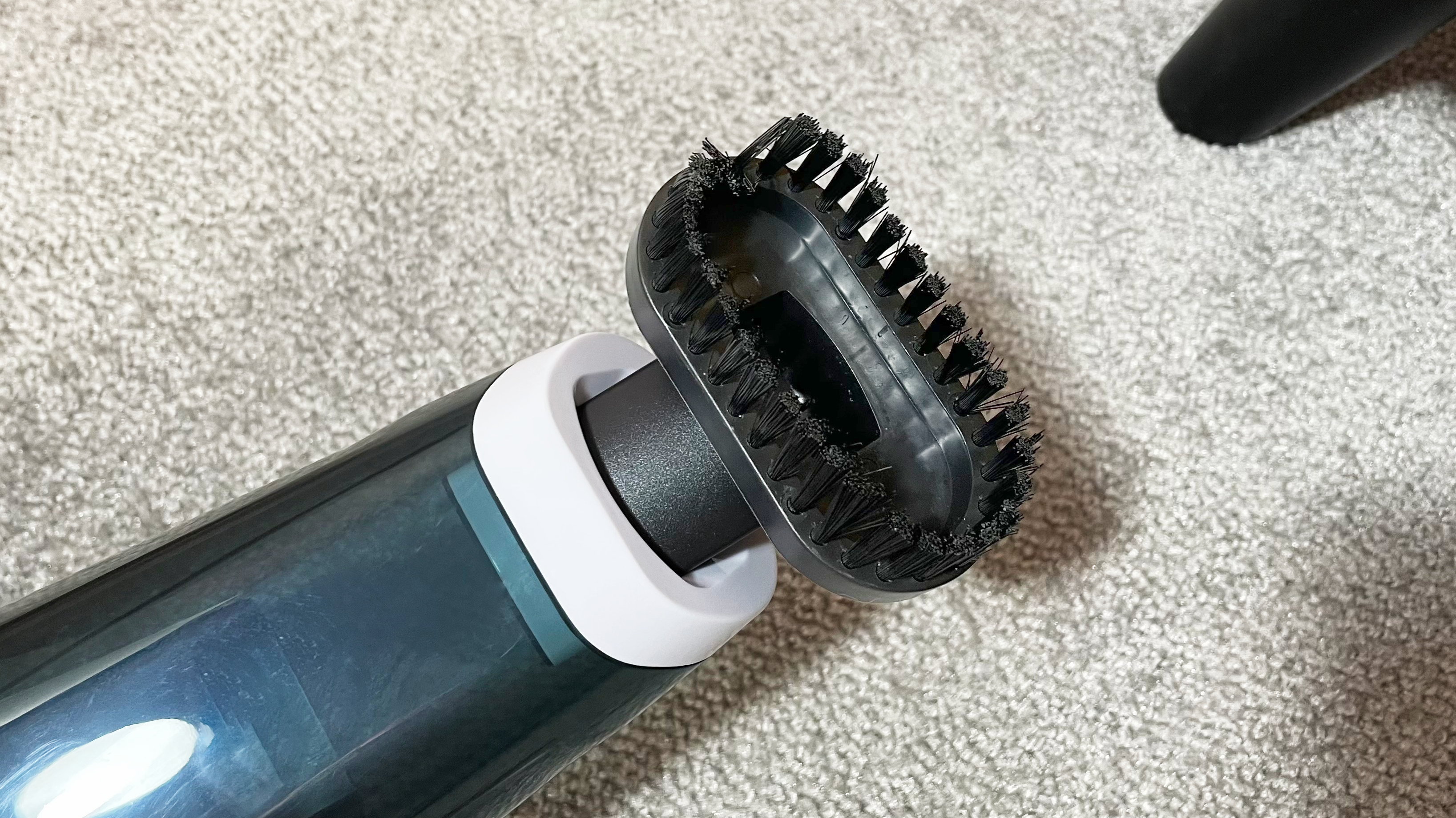 A close-up of the floor brush attachment.