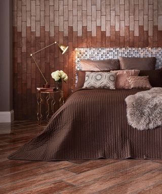 Brown bedroom idea with brown wall tiles