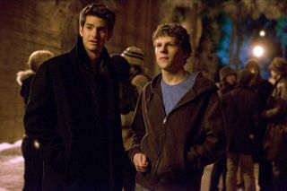 andrew garfield and jesse eisenberg outside of a party in the social network