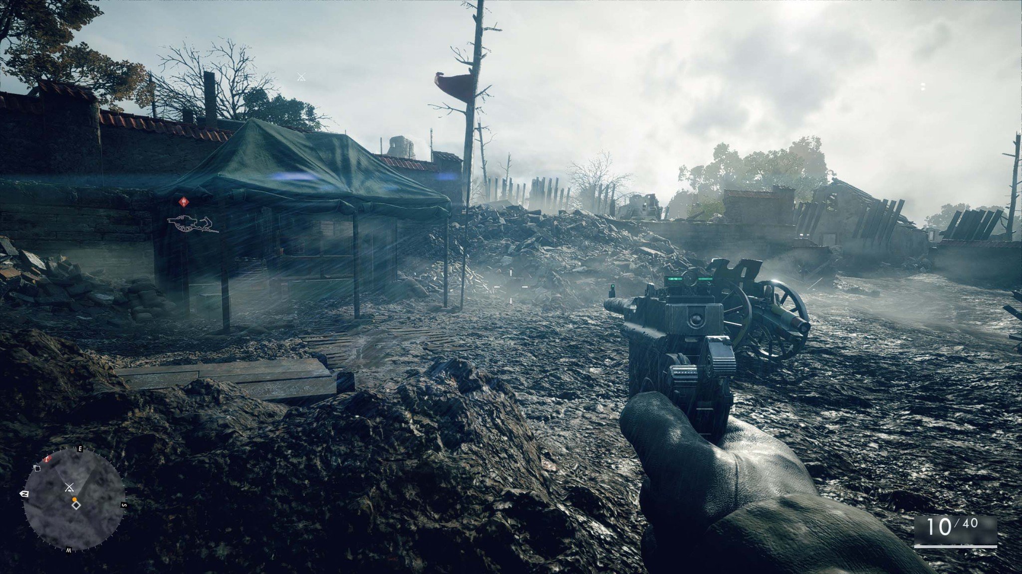 You will see a green tent on your way to the artillery. Head toward it.