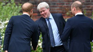 Earl Spencer is greeted by his nephews Prince William, Duke of Cambridge and Prince Harry, Duke of Sussex as he arrives for the Unveiling of a statue of Princess of Wales, in the Sunken Garden at Kensington Palace, on what would have been her 60th birthday on July 1, 2021 in London, England. Today would have been the 60th birthday of Princess Diana, who died in 1997. At a ceremony here today, her sons Prince William and Prince Harry, the Duke of Cambridge and the Duke of Sussex respectively, will unveil a statue in her memory.