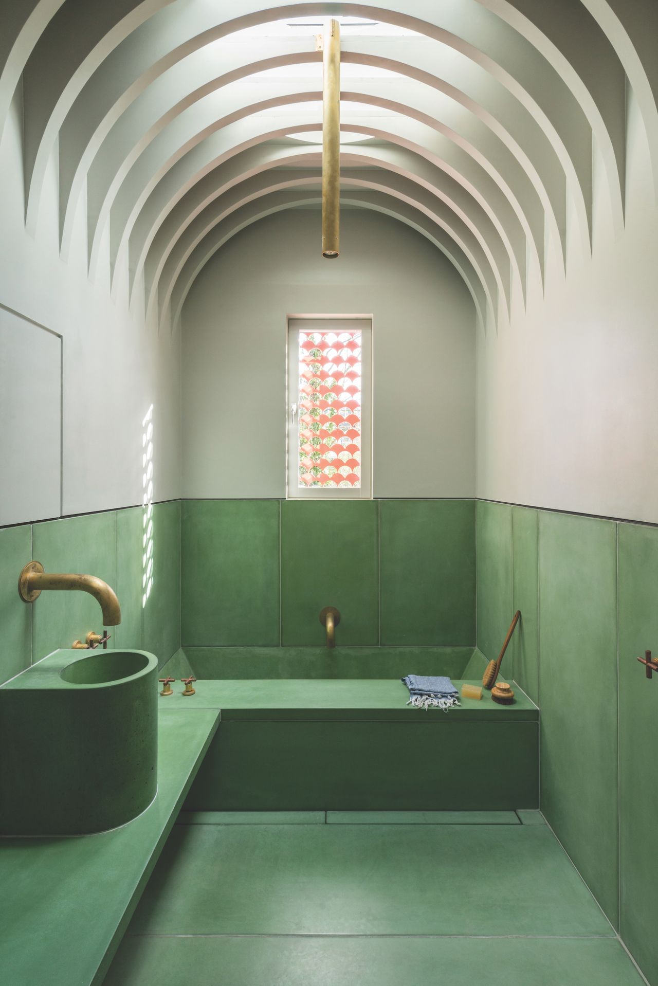 green bathroom with curved vaulted ceiling