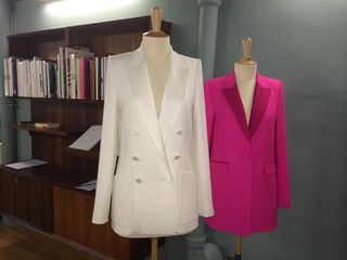 White and pink blazer on mannequins