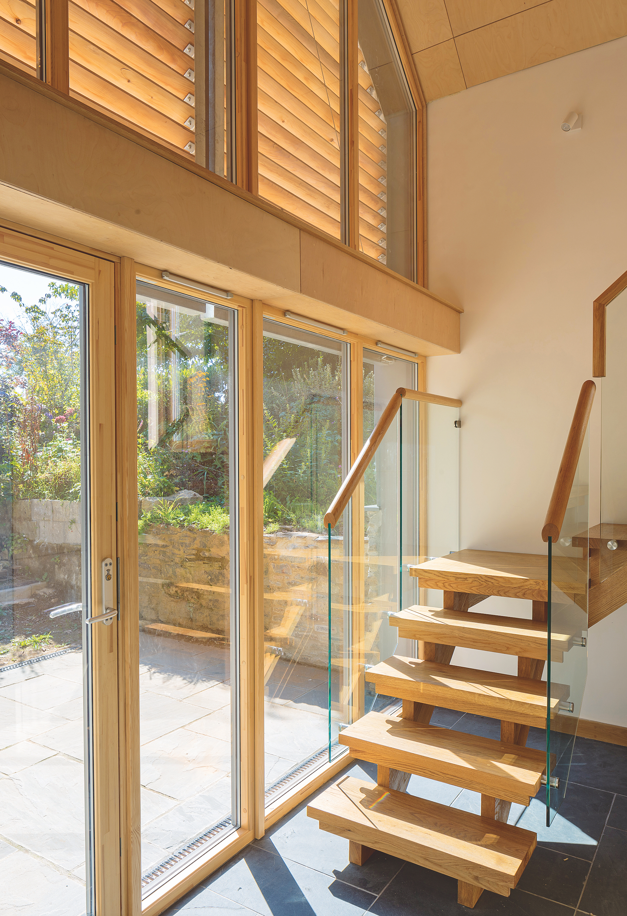entrance hall with staircase and glazing