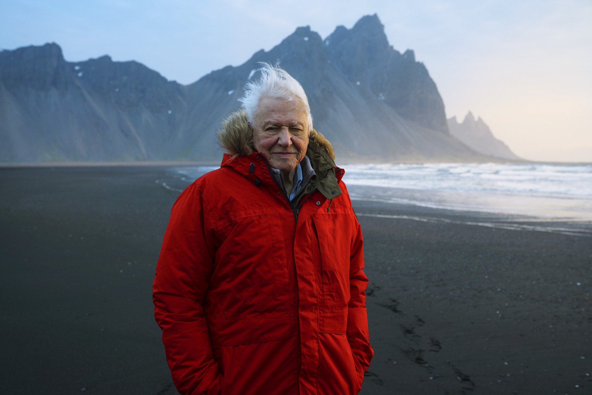 Sir David Attenborough pictured during filming at Stokksnes beach in Iceland for Seven Worlds, One Planet.