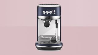 Best espresso machine: Sage the Bambino Plus on pink background