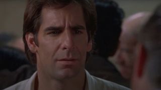 Scott Bakula stands with a confused expression in the Quantum Leap series finale.