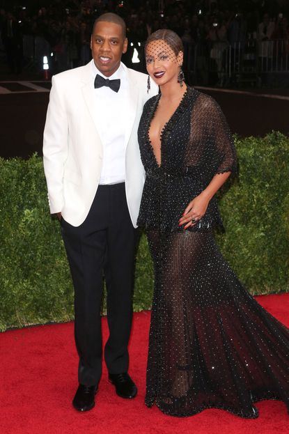 Beyonce in a Givenchy dress at the 2014 Met Ball with husband Jay Z