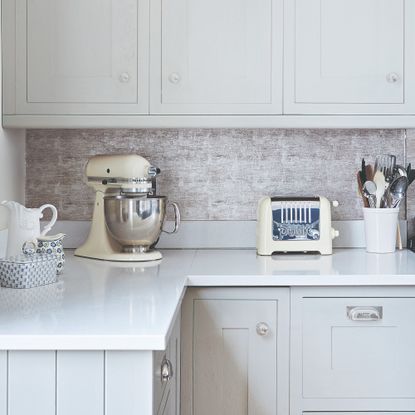 A cream kitchen with Dualit toaster and stand mixer