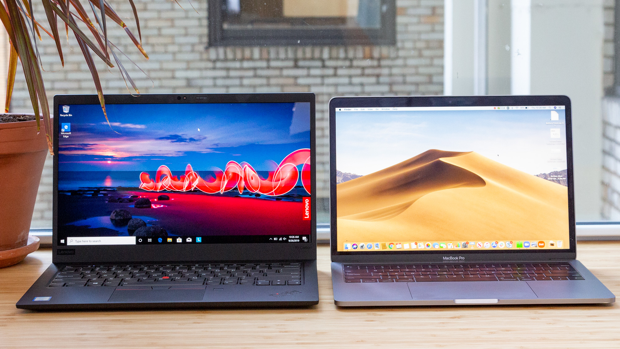 Thinkpad X1 Carbon Vs Macbook Pro Which Laptop Wins Laptop Mag