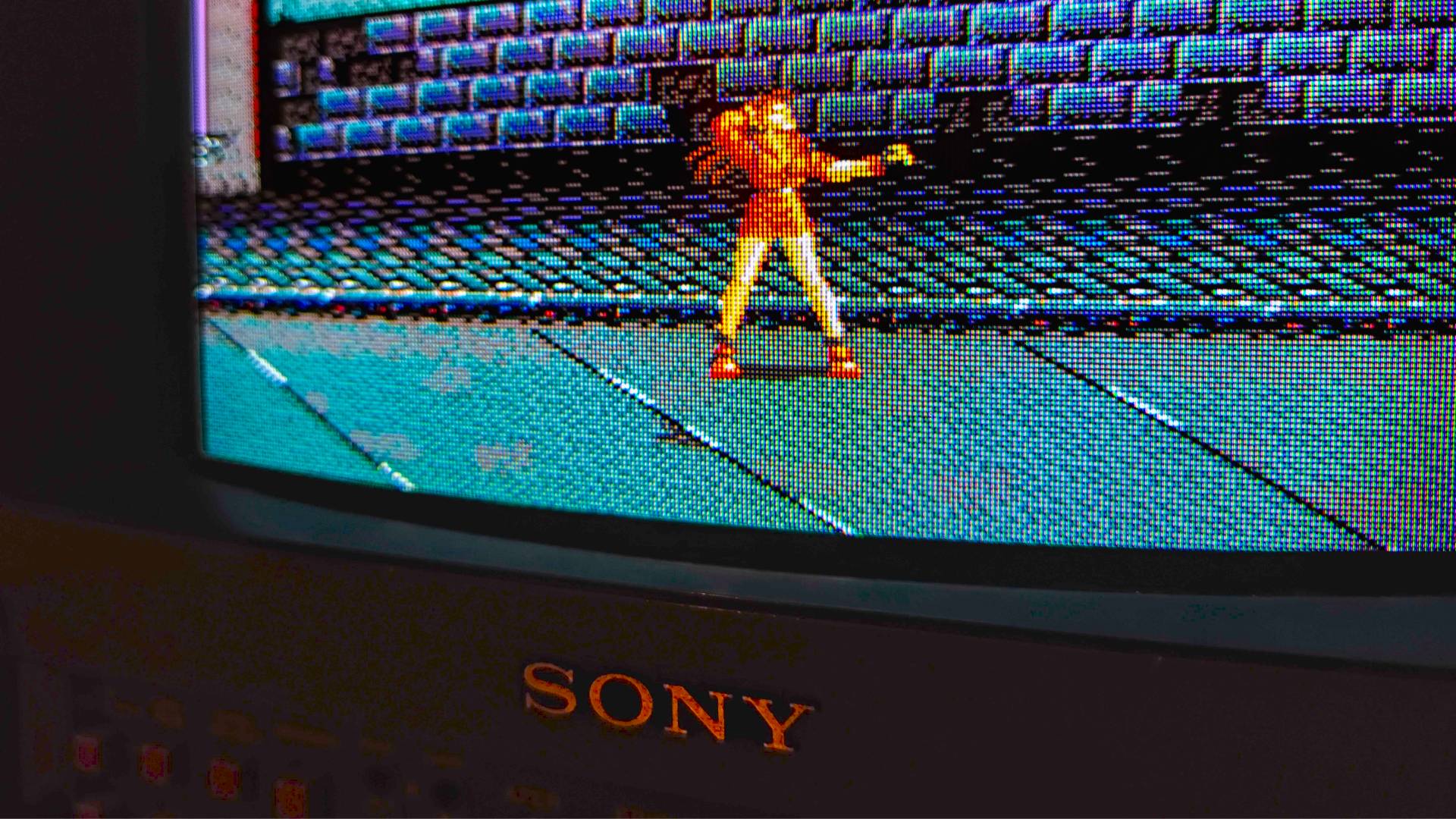 Close up of Sony Trinitron CRT TV with Streets of Rage gameplay on screen featuring Blaze running hand through hair.