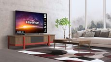 Hisense A7G review - TV on a wooden cabinet 