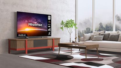 Hisense A7G review - TV on a wooden cabinet 