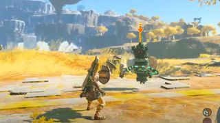 Link holds up a Rocket shield to an approaching Zonai enemy