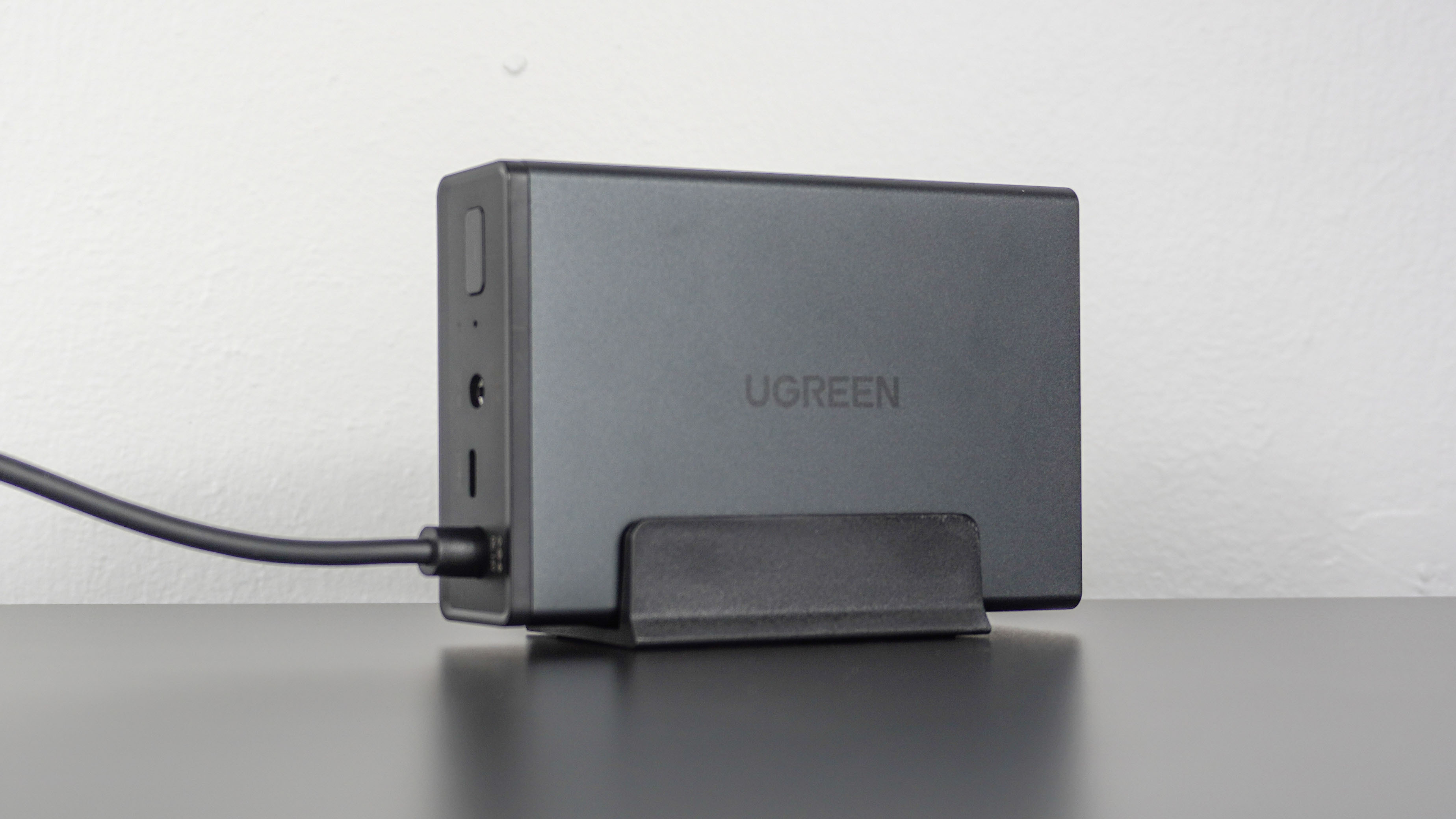 The Ugreen US3000 mini UPS on a desk
