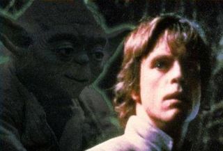 Yoda looks down on Luke creepily