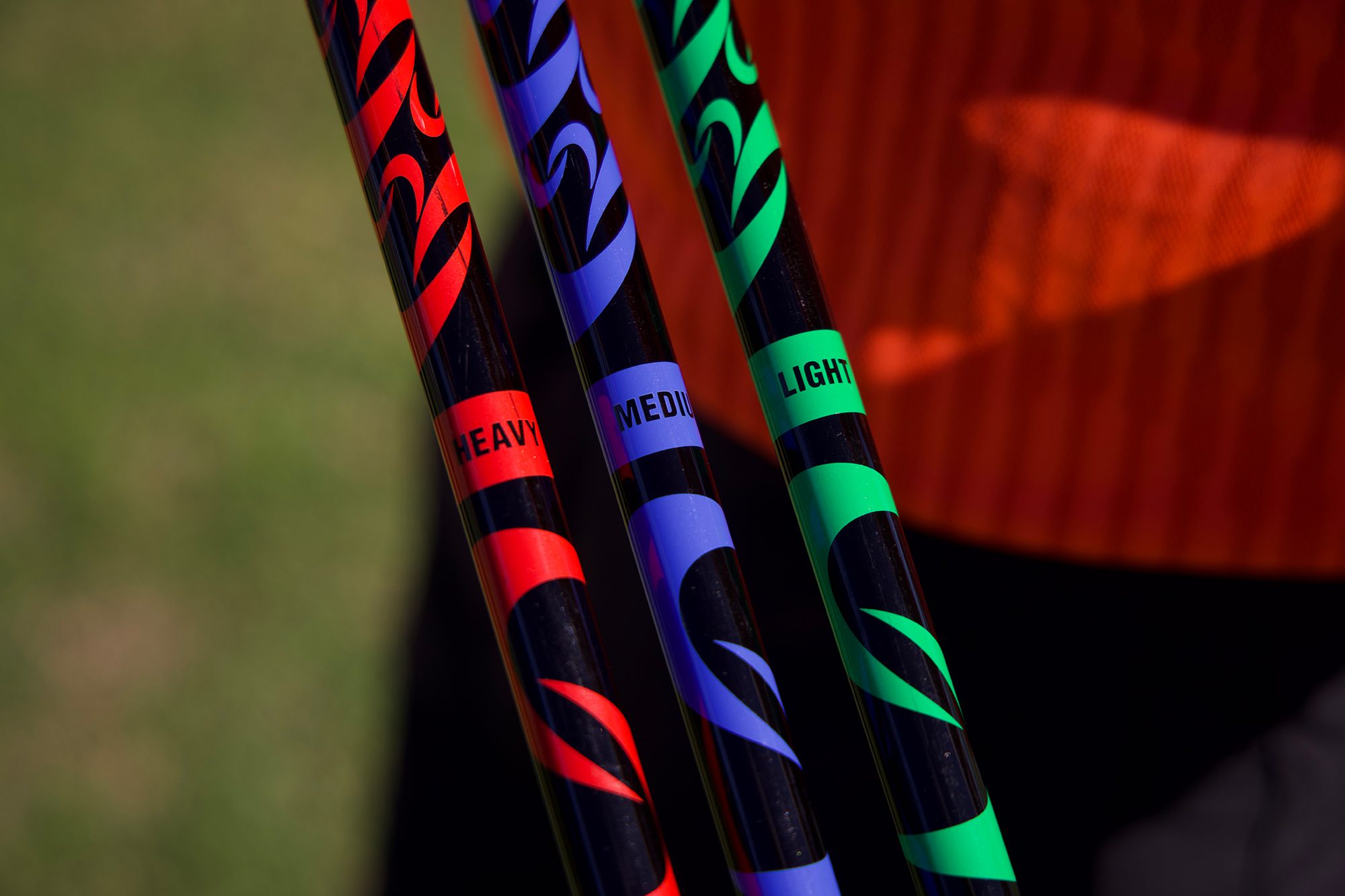 Three Super Speed weighted sticks used to complete overspeed training, in light, medium and heavy weights