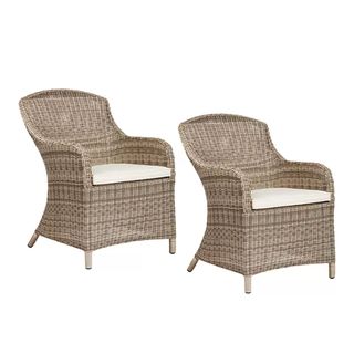 Two rattan-effect garden armchairs