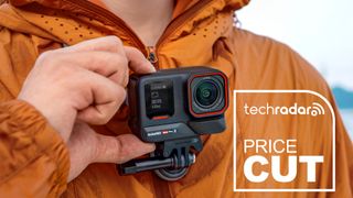 Insta360 Ace Pro 2 action camera worn and adjusted by person in a raincoat and a Price Cut banner