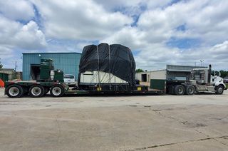 The cabin for the space shuttle motion base simulator arrived back at Johnson Space Center by truck on June 3, 2021.