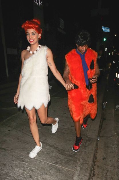 Jasmine Sanders and Terrence J as Wilma and Fred Flintstone