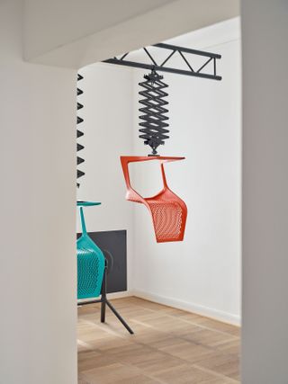 Blue and orange chair hanging