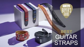 Six guitar straps on a purple background