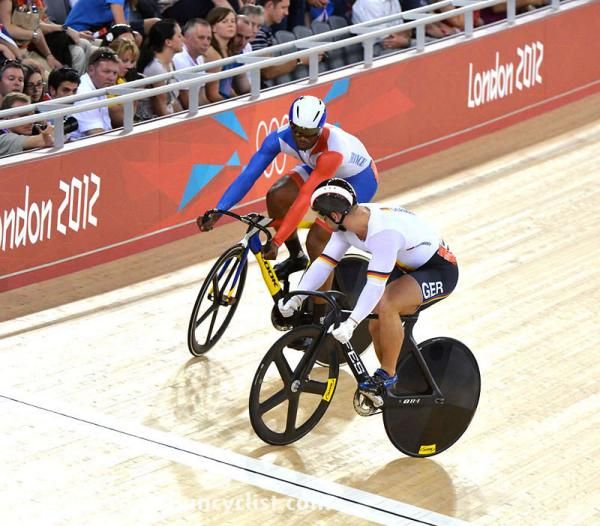 Gregory Bauge (France) Robert Forstemann (Germany) mix it up in the sprint quarter finals.