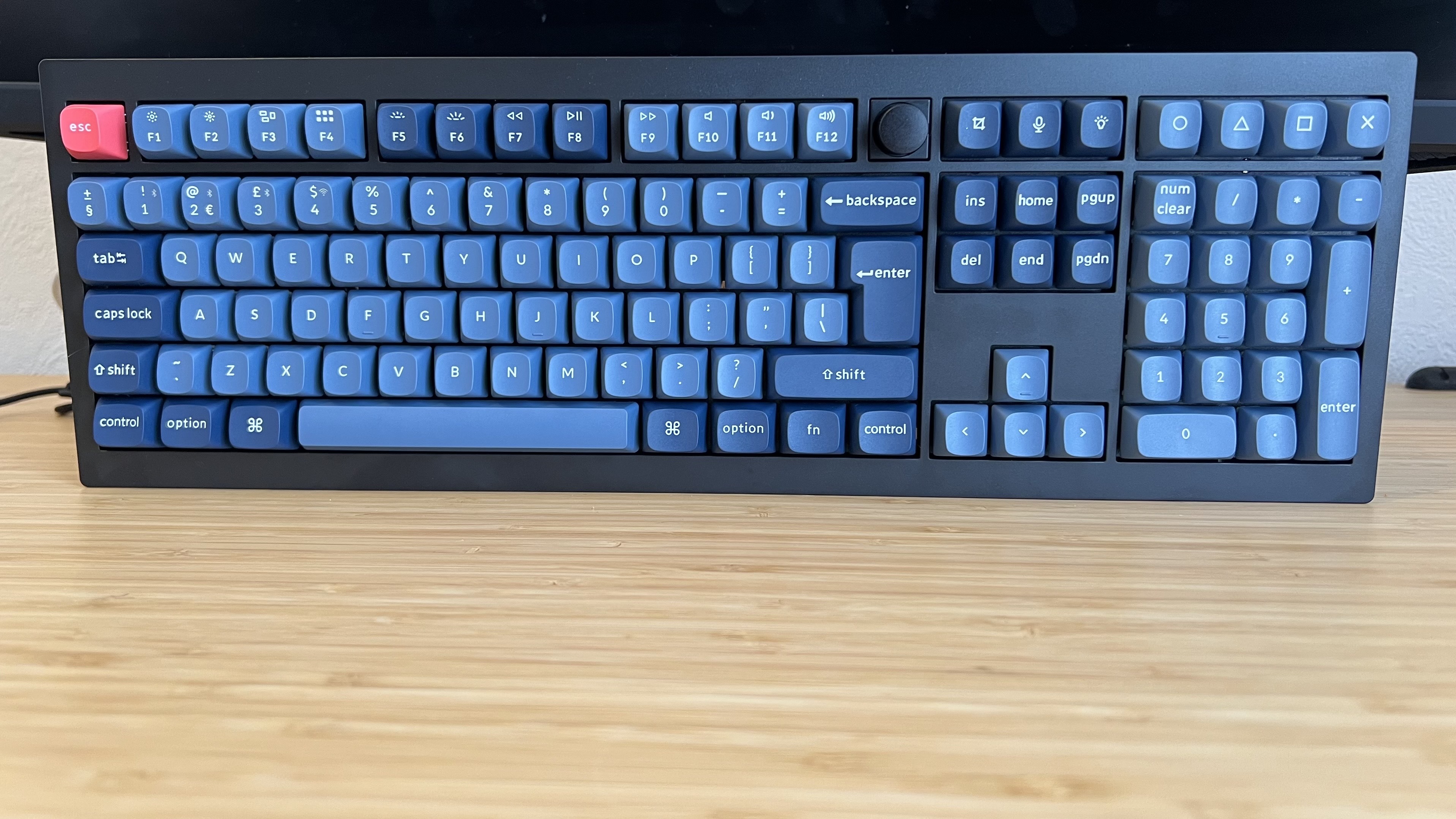 Keychron V6 Max keyboard on a wooden desk
