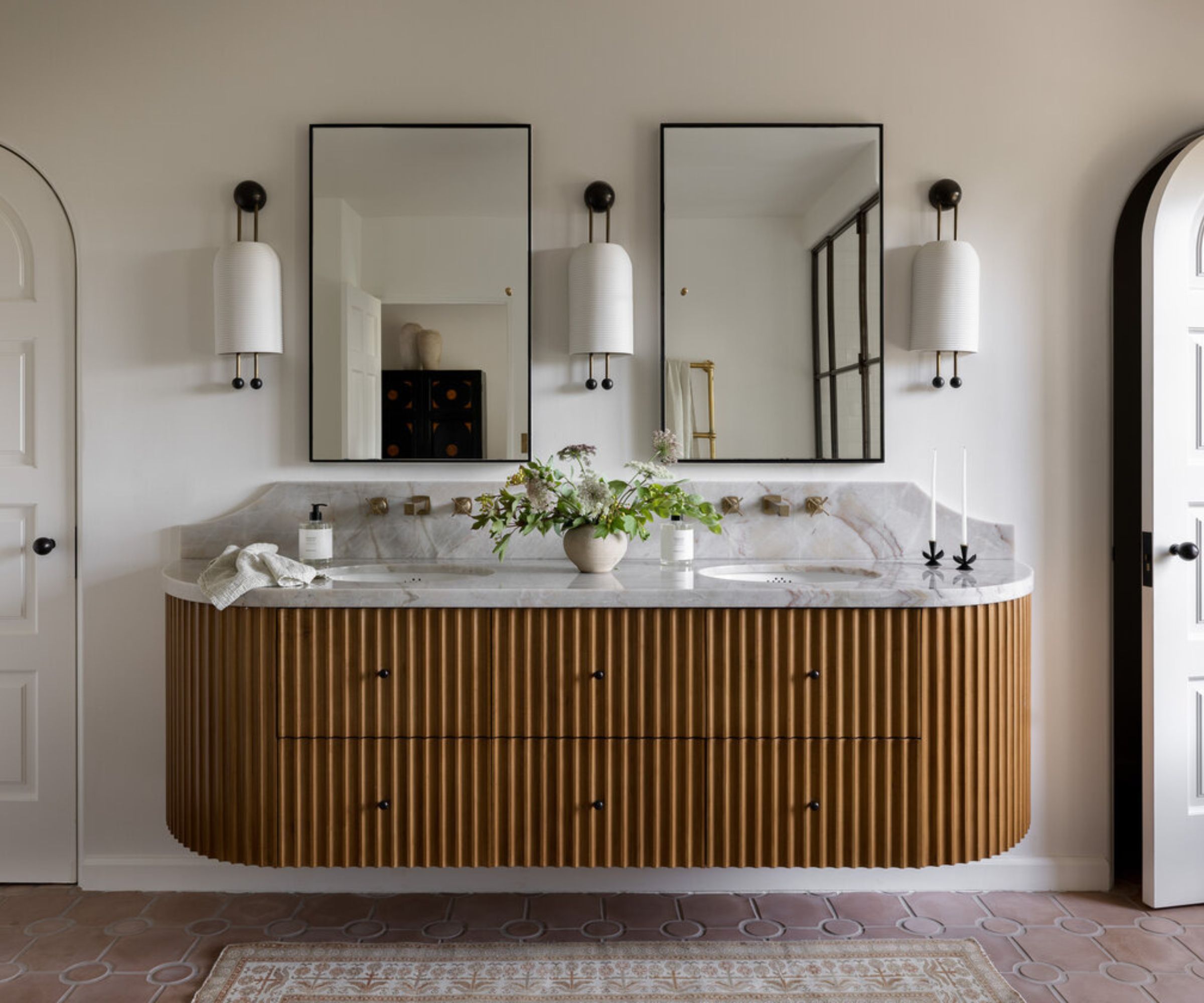 bathroom with a wooden fluted vanity