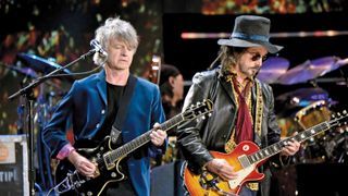 Fleetwood Mac’s Neil Finn (left) and Mike Campbell perform September 21 in Las Vegas