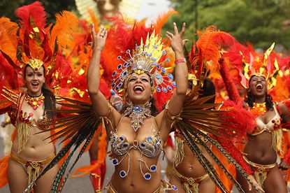 LONDON, MONDAY: Dancers take part in the Notting Hill Carnival, the capital's annual celebration of Caribbean culture.