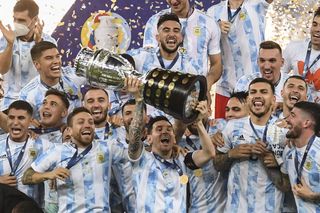 Lionel Messi and his Argentina team-mates celebrate their Copa America win in 2021.