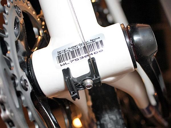 Press-fit bottom bracket cups save a few grams and also allow for wider chain stay spacing.