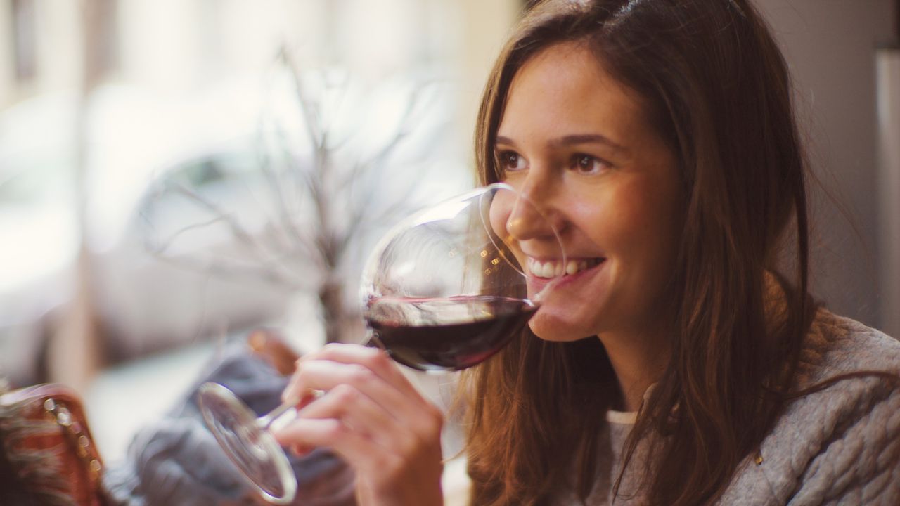 Woman enjoying a glass of wine