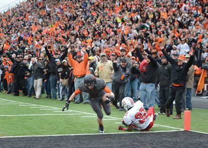 A capacity crowd reacts as the Tigers score a touchdown against Canton McKinley at Paul Brown Tiger Stadium in 2012.