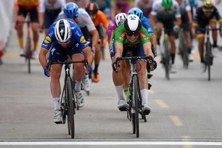KUSADASI TURKEY APRIL 18 Sprint Arrival Mark Cavendish of United Kingdom and Team Deceuninck QuickStep Jasper Philipsen of Belgium and Team AlpecinFenix Green Points Jersey during the 56th Presidential Cycling Tour Of Turkey 2021 Stage 8 a 1603km stage from Bodrum to Kuadas TUR2021 tourofturkeyTUR on April 18 2021 in Kusadasi Turkey Photo by Stuart FranklinGetty Images