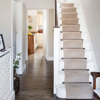 hallway with stair case and wooden floor