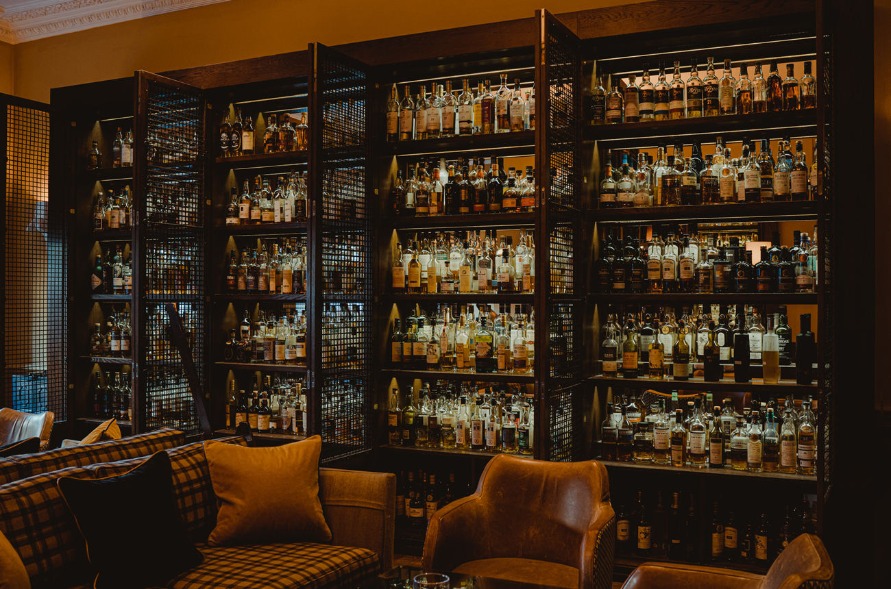 Rows of bottles of whisky in the Scotch bar at The Balmoral Hotel