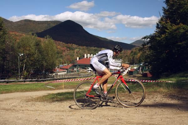 Philip Wong (Seaside Cycle - Antero Resources) checks the progress of the riders behind him.
