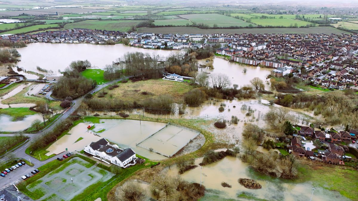 Aerial shot of town and park with flooding