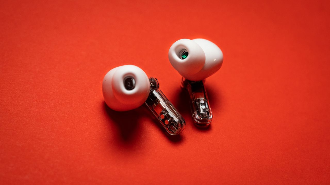 Nothing Ear (2) earbuds review on red background