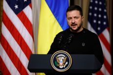 Ukrainian President Volodymyr Zelensky speaks during a news conference with and U.S. President Joe Biden