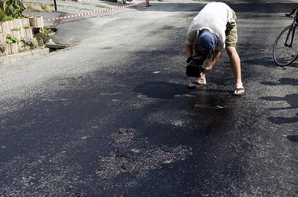 The roads in stage 14 were melting in the heat and were chopped up by the Tour caravan