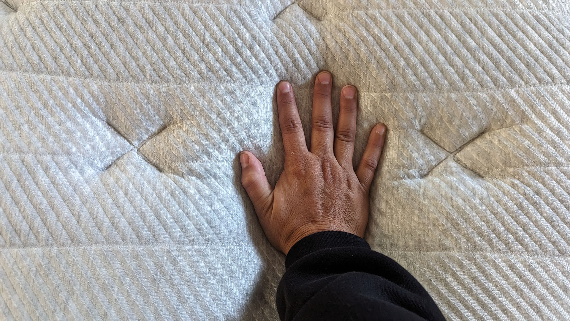 Close up of cover on Leesa Oasis Chill Hybrid mattress