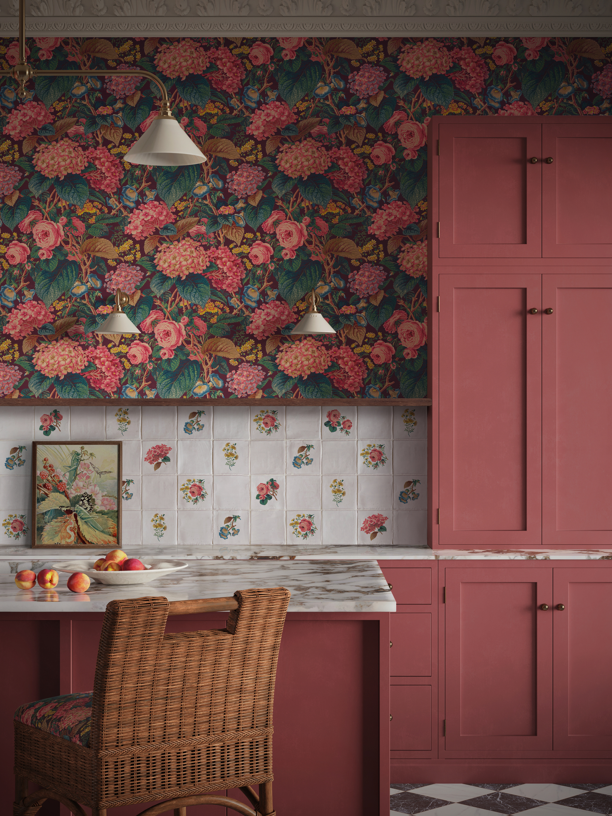 Image of a kitchen with dark pink cabinetry and white marble countertops. There are floral, hand-painted tiles and a pink and teal floral print wallpaper.